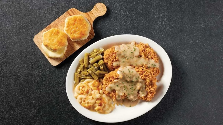 Cracker Barrel's Country Fried Pork Chops with biscuits and sides