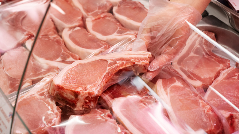 Fresh pork chops at the meat counter