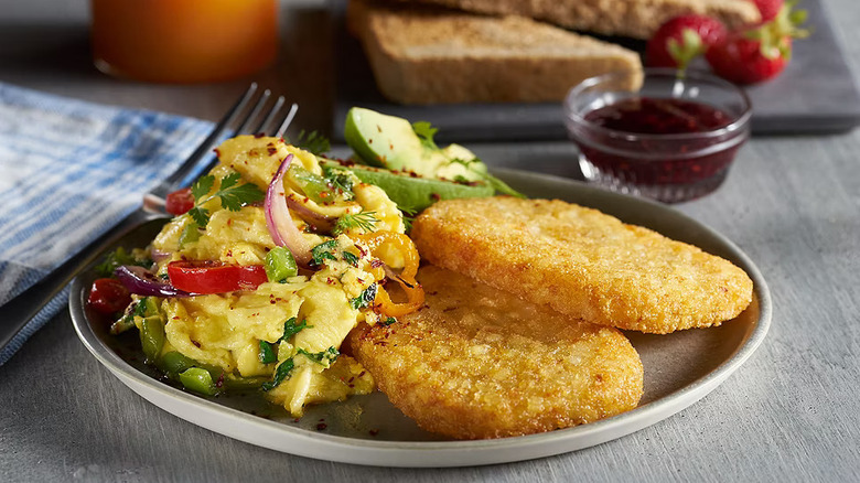 Lamb Weston hash brown patties with eggs on a plate