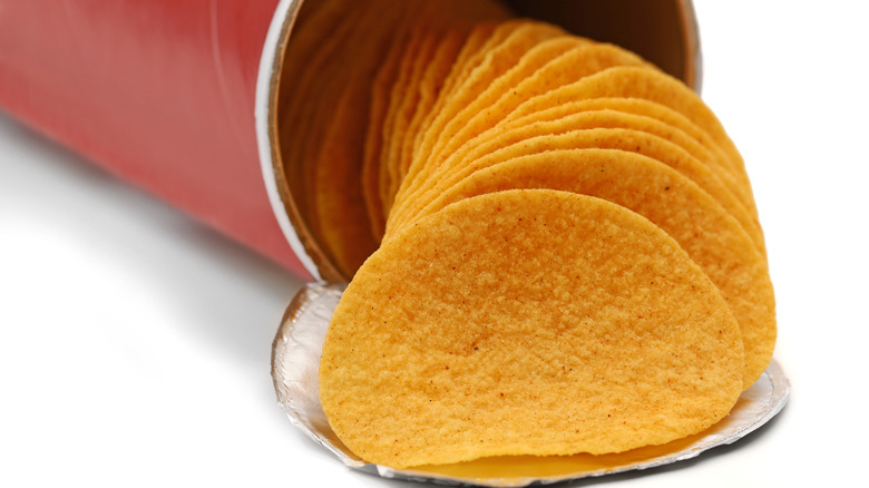 Pringles spilling out of an unmarked can