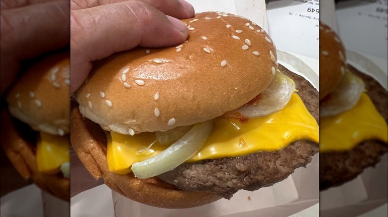 Handheld McDonald's Quarter Pounder