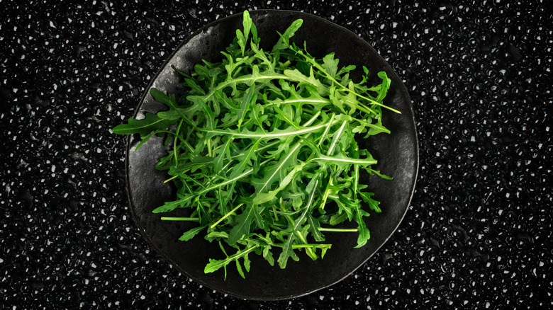 a bowl of arugula