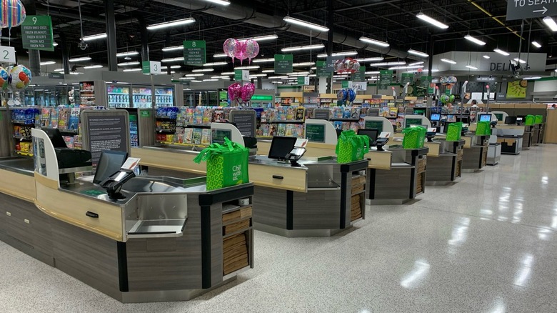 Row of checkout counters in an empty Publix store