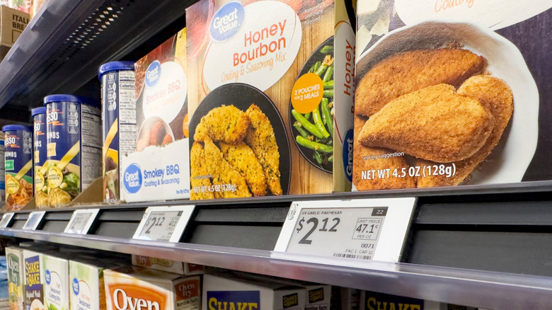 Price labels beneath grocery products on Walmart shelf