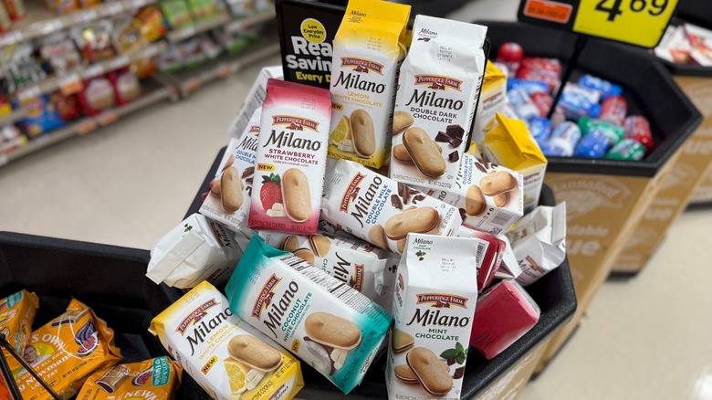 Multiple flavors of Milano cookie bags in a grocery store display