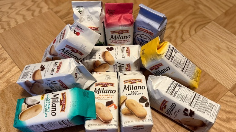 Pile of leftover Milano cookies with crumbs on a green plate