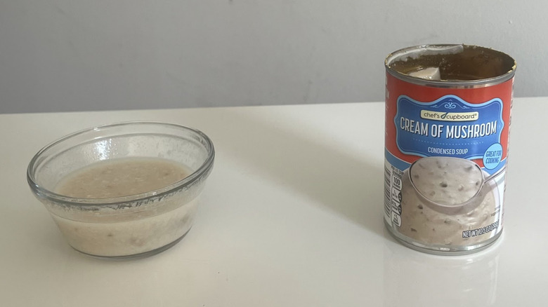 A can sits next to a bowl of Chef's Cupboard Cream of Mushroom