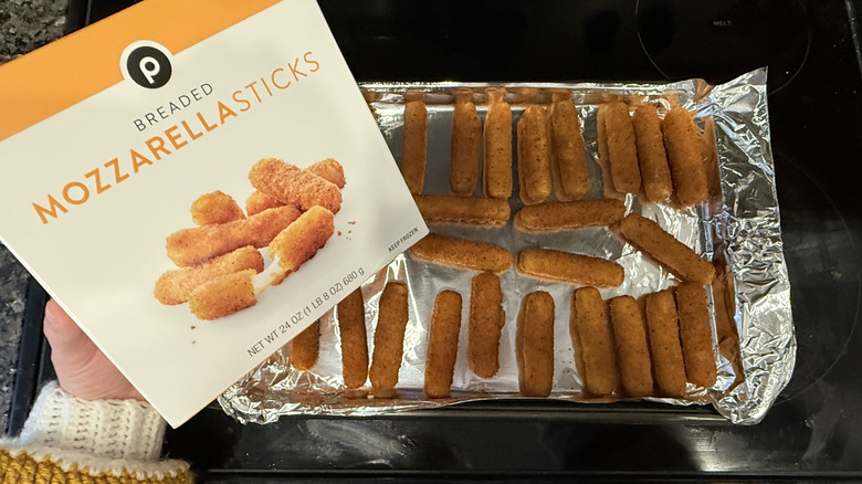 Publix mozzerella sticks on a pan next to the box