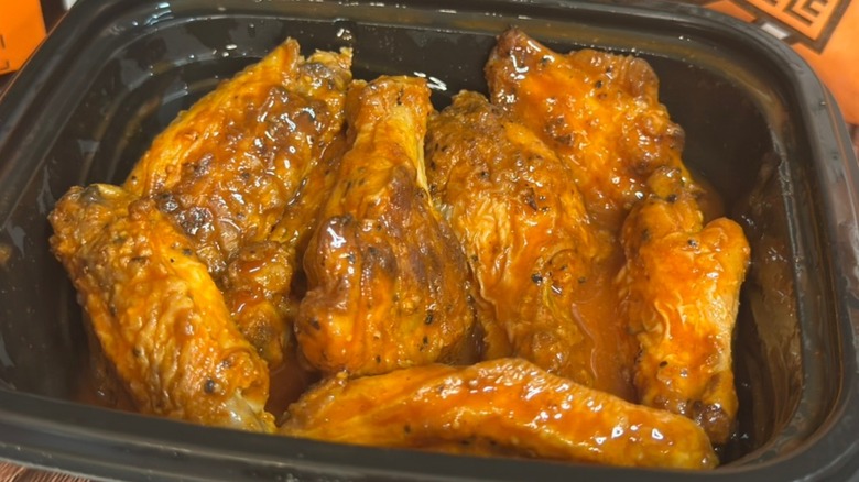 Caesar Wings in black container