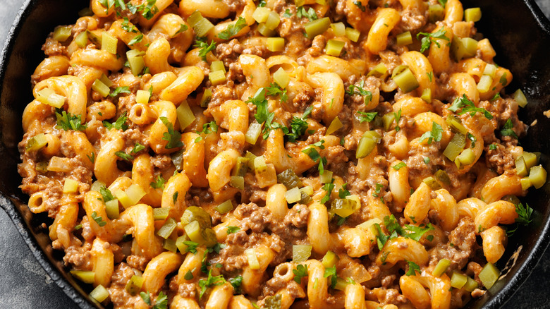 Macaroni and cheese with ground beef in a pot.
