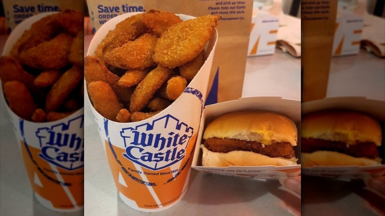 An order of White Castle Onion Chips next to a fish slider.