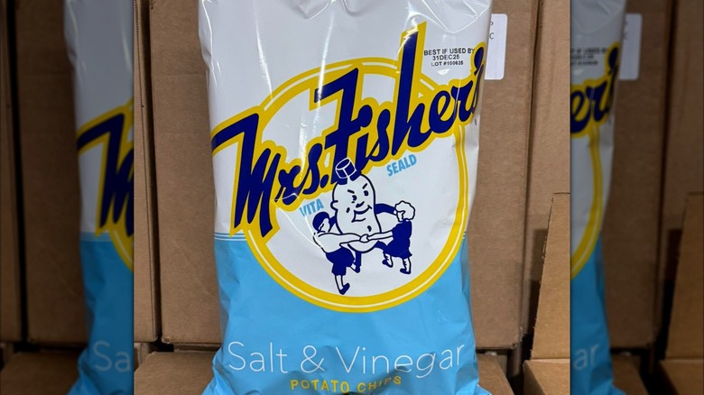 bag of Mrs. Fisher's Salt and Vinegar chips against cardboard box