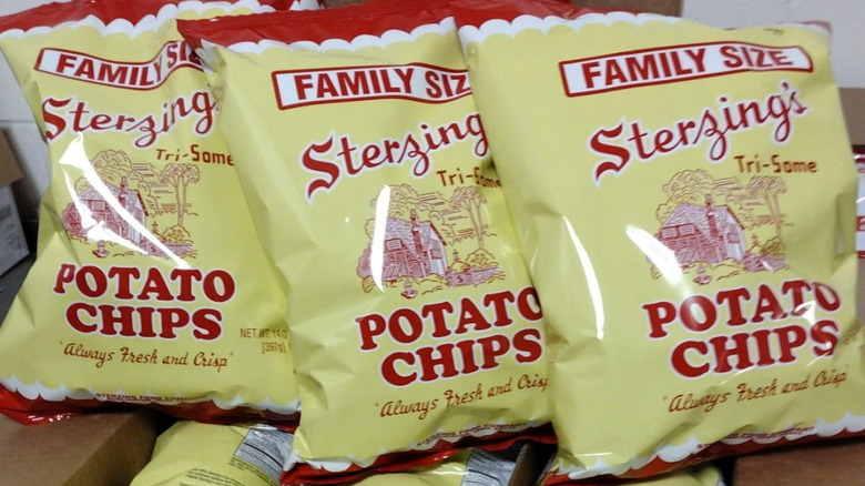 three yellow bags of Sterzing's Potato Chips leaning on each other