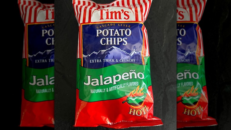 bag of Tim's Cascade Style jalapeño potato chips on dark surface