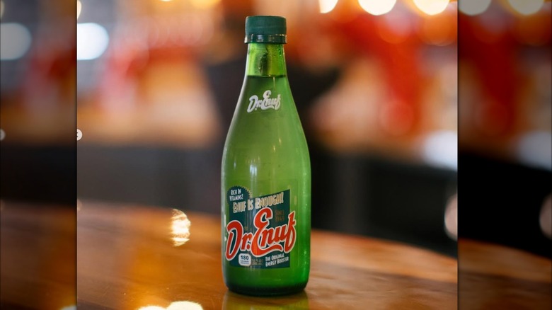 bottle of Dr. Enuf on wood table