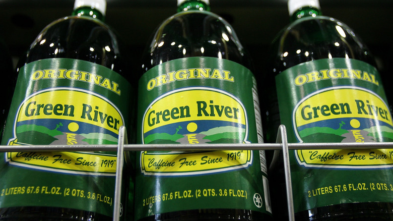 Green River soda bottles on rack in store