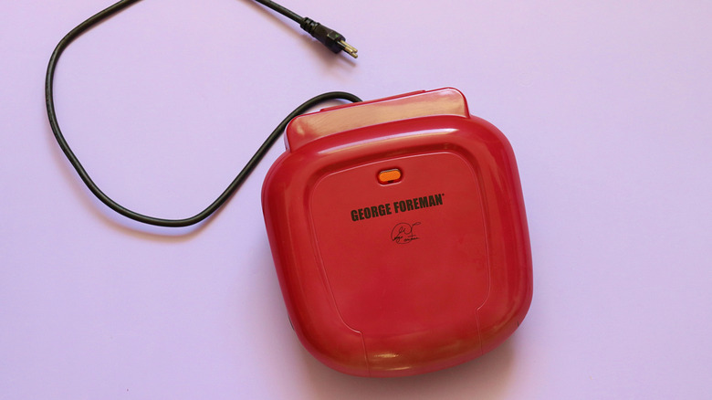 Top view of a red vintage George Foreman Grill