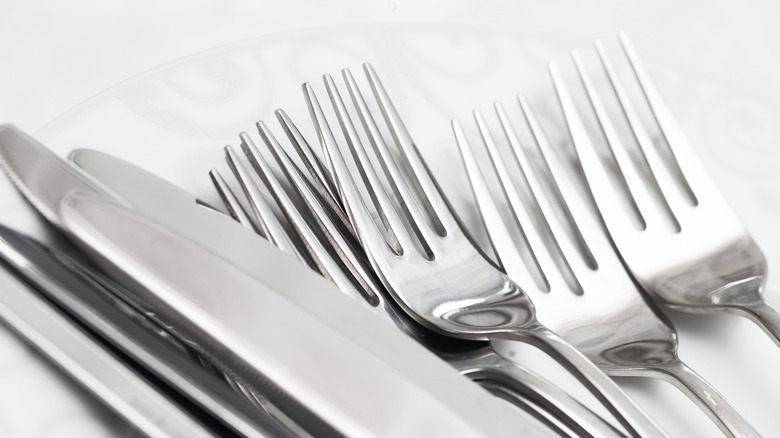 Silverware against a white background.