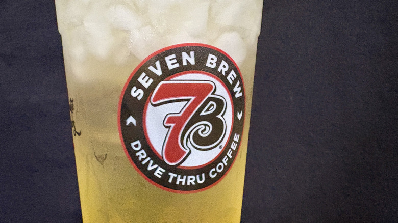 Close-up of yellow 7 Brew drink