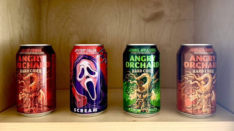 Angry Orchard Thriller Pack cans on a wooden shelf