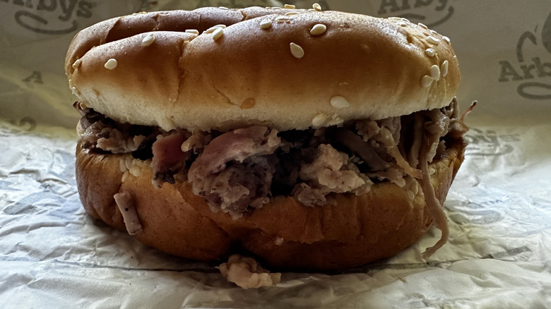 Arby's Quarter Pound pulled pork sandwich in wrapper