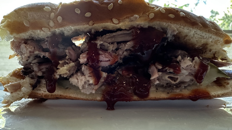 Arby's Quarter Pound pulled pork sandwich sauced