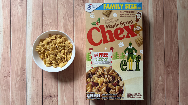 A bowl and box of Elf-branded Maple Syrup Chex