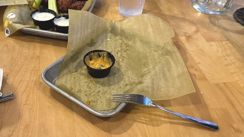 Empty metal plate at Buffalo Wild Wings