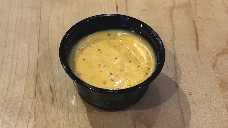 Black cup of B-Dubs Dip
