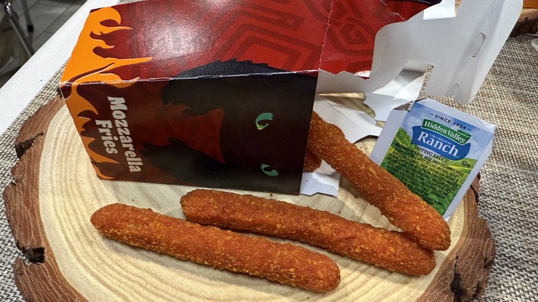 an open box of Fiery Dragon Mozzarella Fries