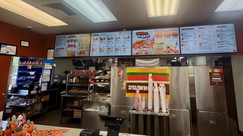 The interior order board in a Burger King restaurant.