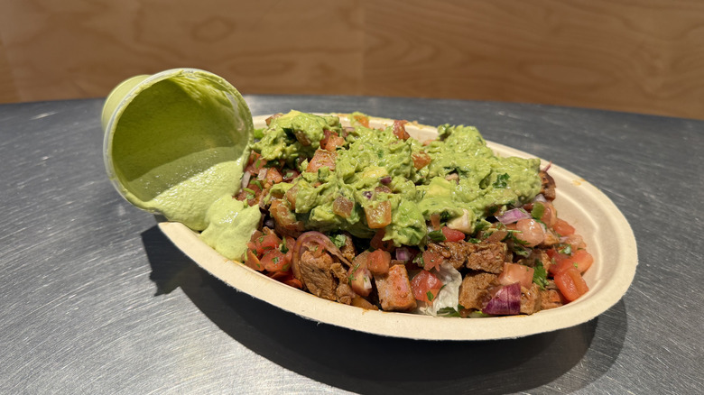 Chipotle's Cilantro Lime Sauce poured over a salad