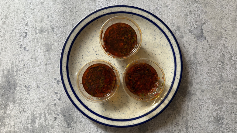 three cups of Red Chimichurri Sauce