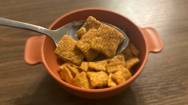 Cinnamon Toast Crunch Mega Chamoy-Flavored Cereal on a spoon close up