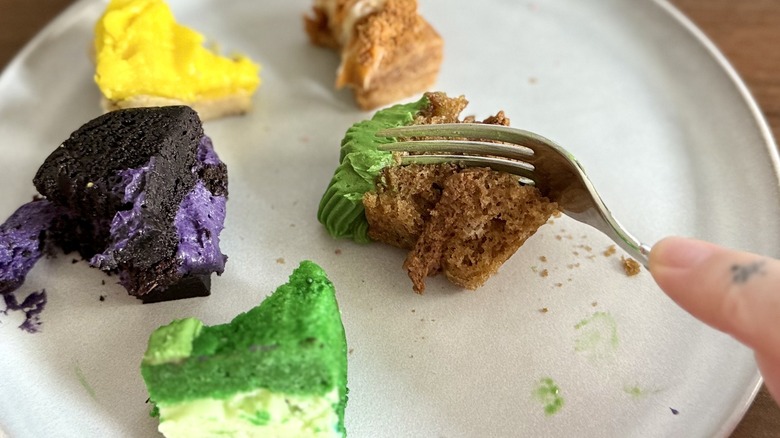 Eating piece of cake with a fork