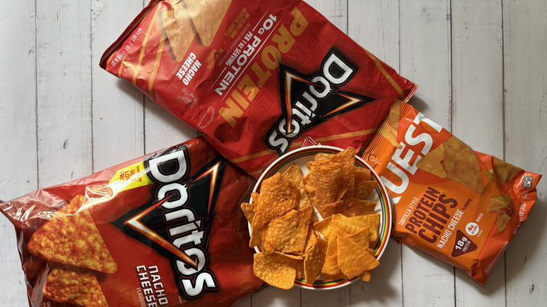 three kinds of nacho cheese chips meet at one plate