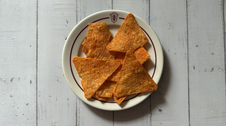 a plate of Doritos Protein -- Nacho Cheese chips