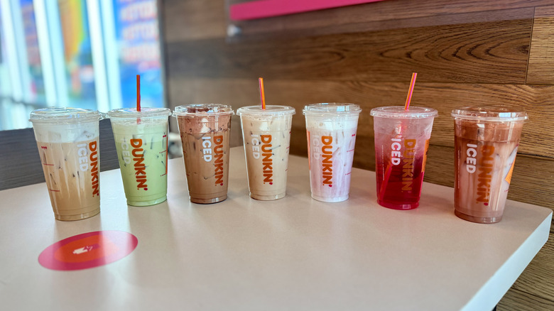 Collection of Dunkin' drinks on a table