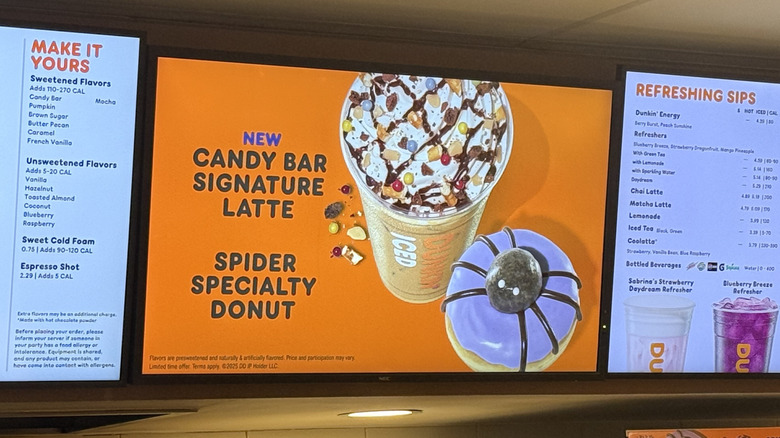 A menu screen at Dunkin' featuring the Halloween menu items