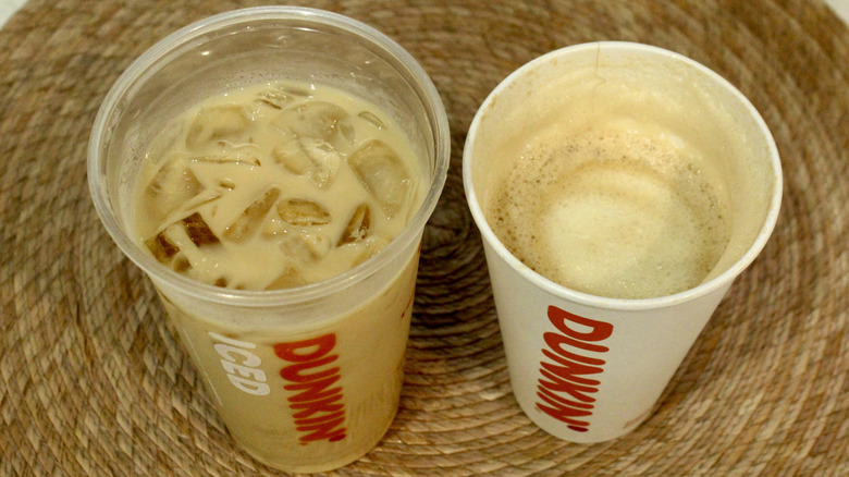 Pair of Dunkin' lattes partly filled