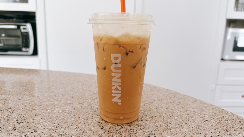 Dunkin' Banana Puddin' Cloud Latte on granite counter
