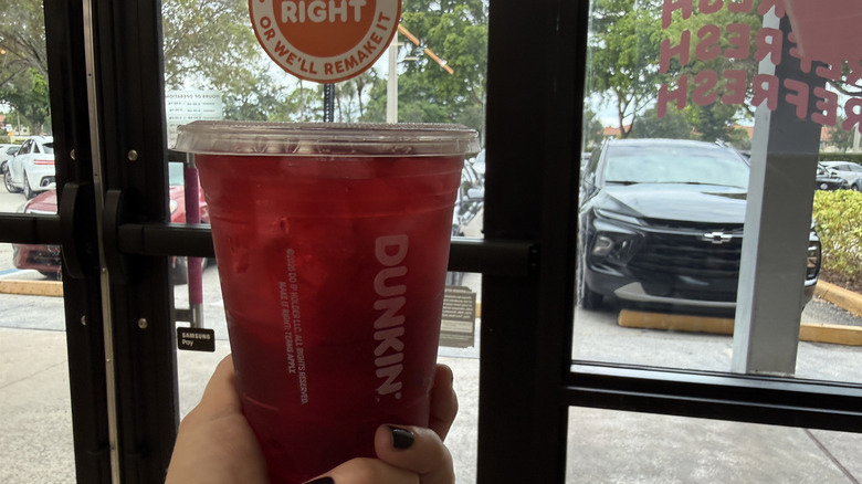Werewolf Punch Refresher in front of Dunkin' door