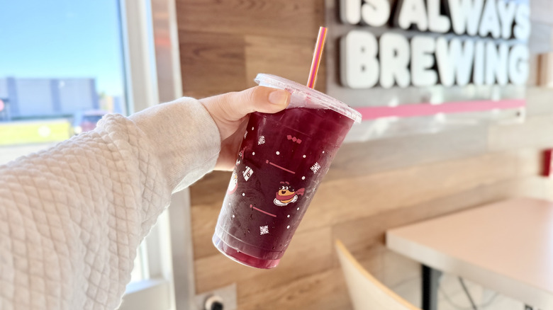 Hand holding a Blueberry Sangria Lemonade Refresher