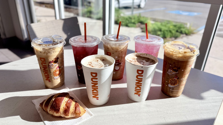Collection of Dunkin' drinks on a table