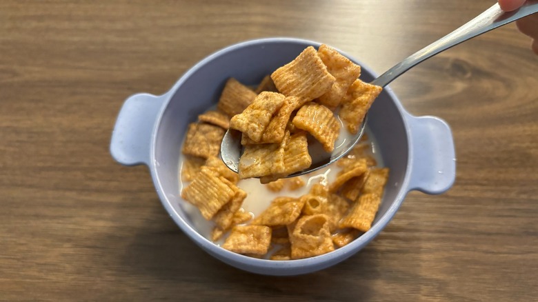 Cinnamon Toast Crunch Root Beer Float cereal with milk on spoon