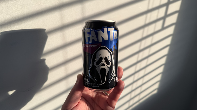 Can of Fanta Ghost Face Punch in the shadows