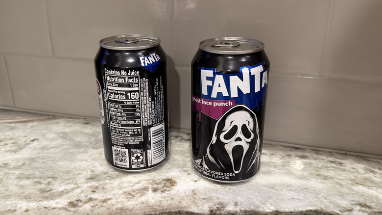 two cans of Fantas Ghost Face Punch on a counter