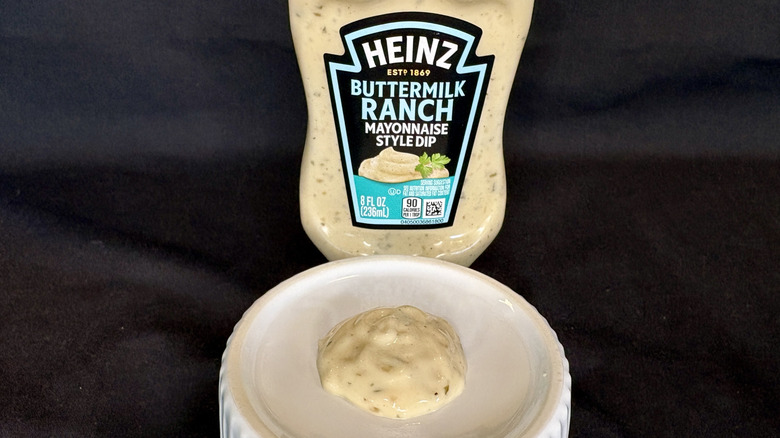 Buttermilk Ranch sauce on white dish with Heinz bottle in background