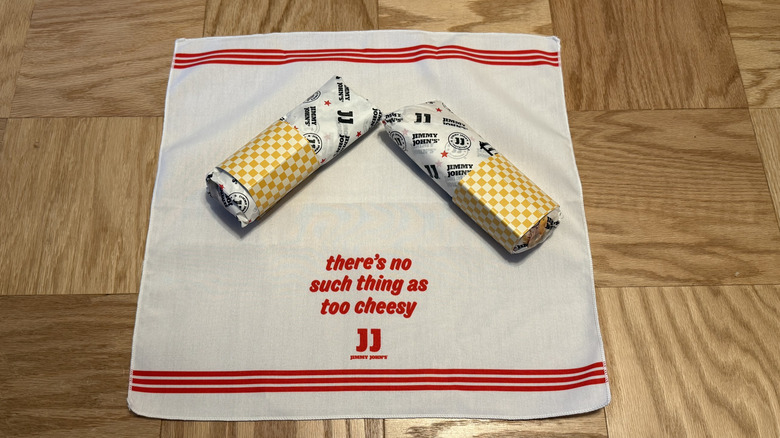 two Toasted Pizza Sandwiches lay on a fun napkin