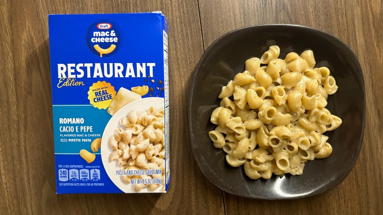 Kraft Mac & Cheese Restaurant Edition Romano Cacio e Pepe box and macaroni on plates
